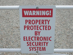 The sign at our gate says: Warning! Property protected by electronic security system